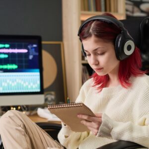 Creative teenage songwriter in studio